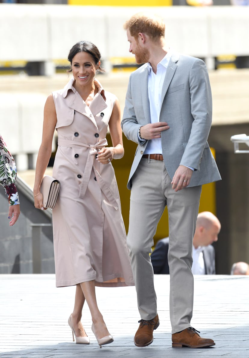 Meghan Markle styled a trench coat as a dress for the Nelson Mandela Centenary exhibition in Septemb...