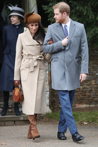 Meghan Markle wore a statement hat and knee-high bots from Stuart Weitzman in December 2018. 