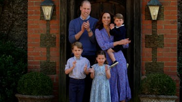 Kate Middleton and Prince William take a family photo.