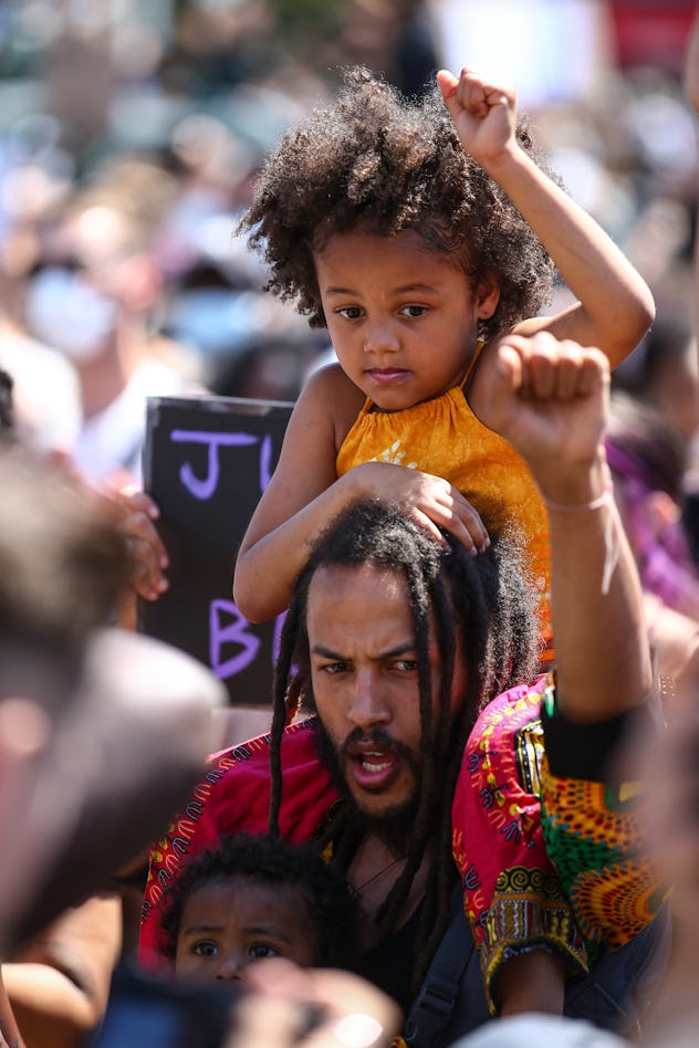 Father and children protest in London 