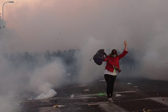 There is some evidence that tear gas could even cause miscarriages. So why are police still using it...