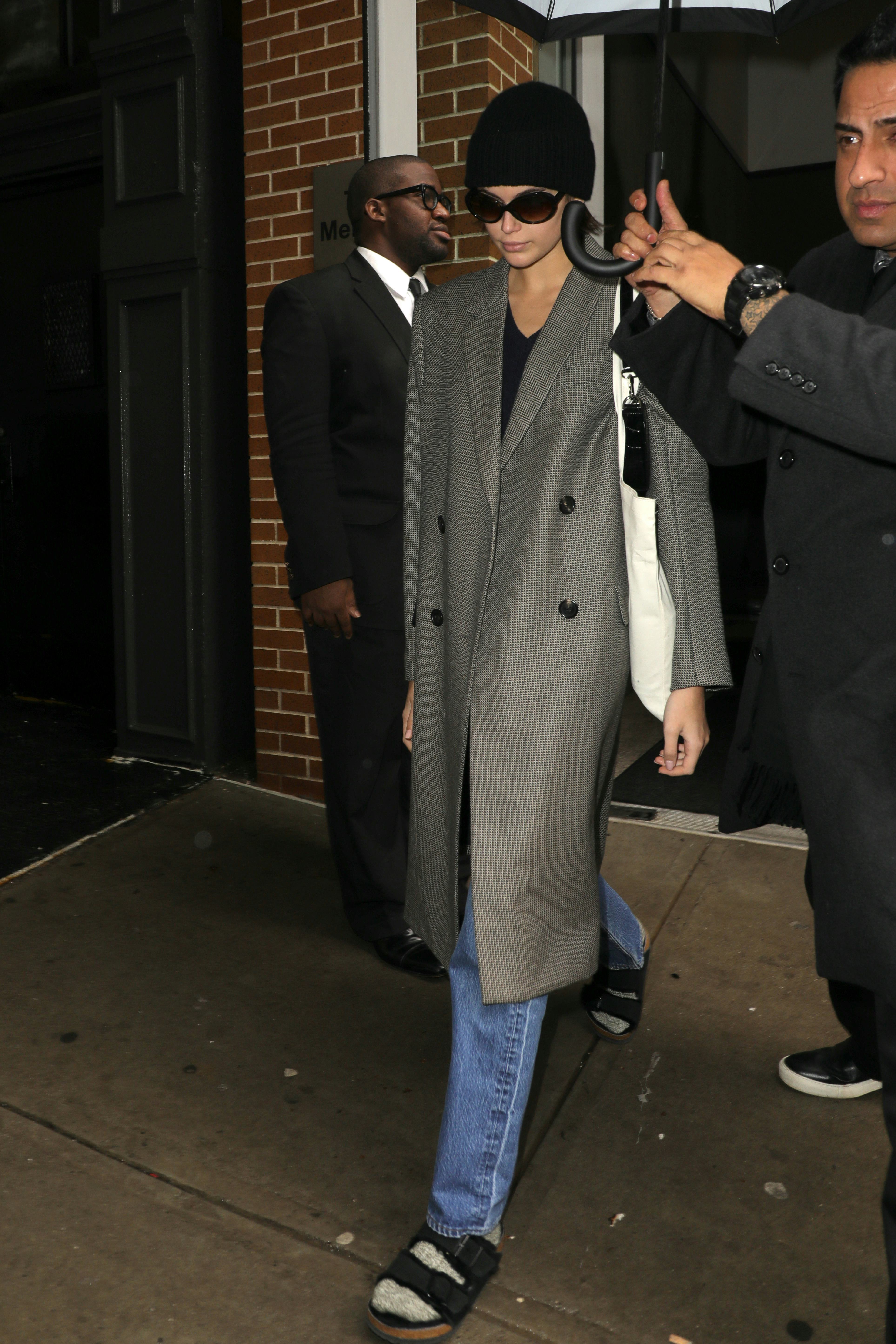 Kaia Gerber in a gray Fendi coat and black Birkenstocks.