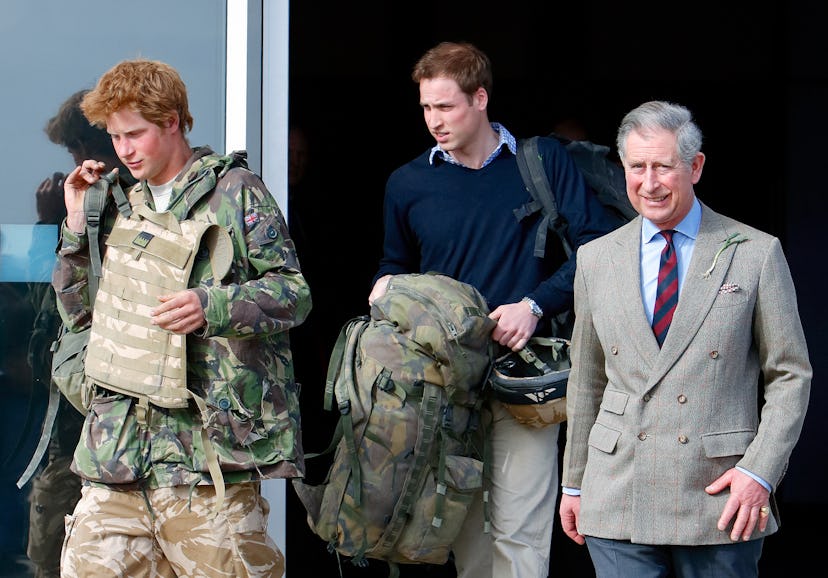 Prince Charles welcomes Prince Harry home from his tour of duty.