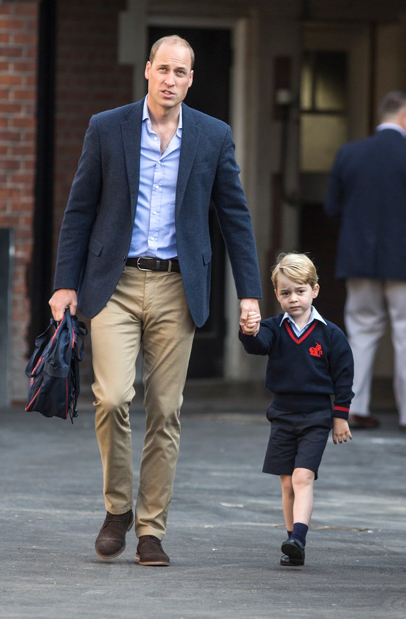 Prince William brings Prince George to school.