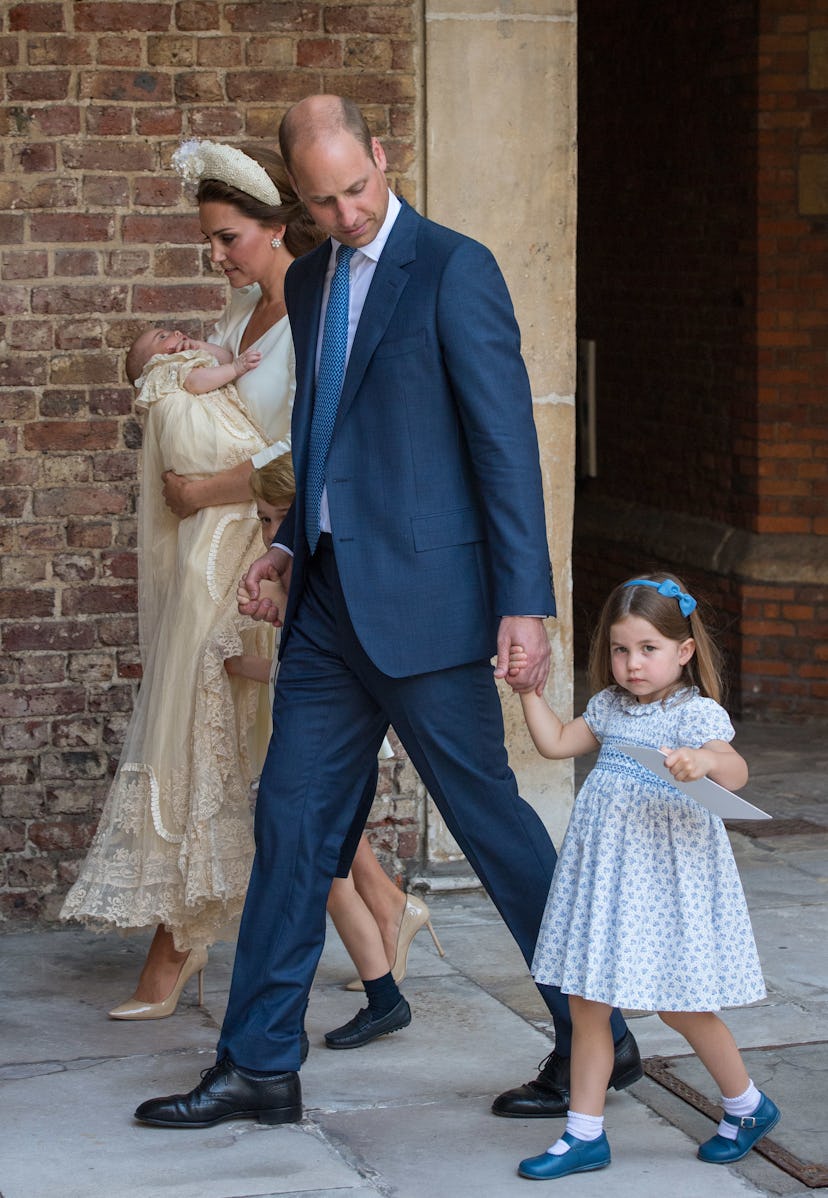 Princess Charlotte stares down the media as her dad hides a smirk.