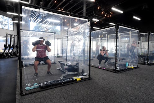 These Photos Of Pandemic Plastic Fitness Pods Are As Post-Apocalyptic As You'd Imagine