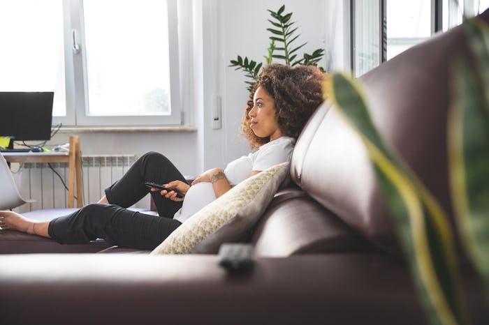 pregnant woman on couch