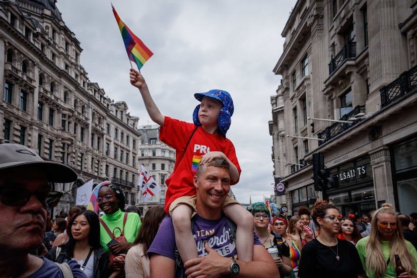 A boy and a man celebrate Pride together