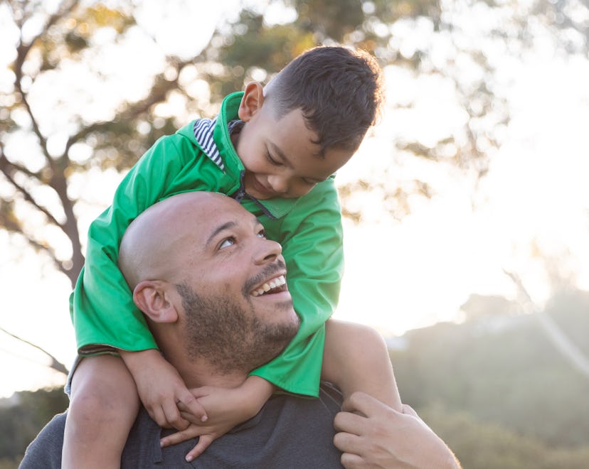 father with his son on his shoulder, father's day poems