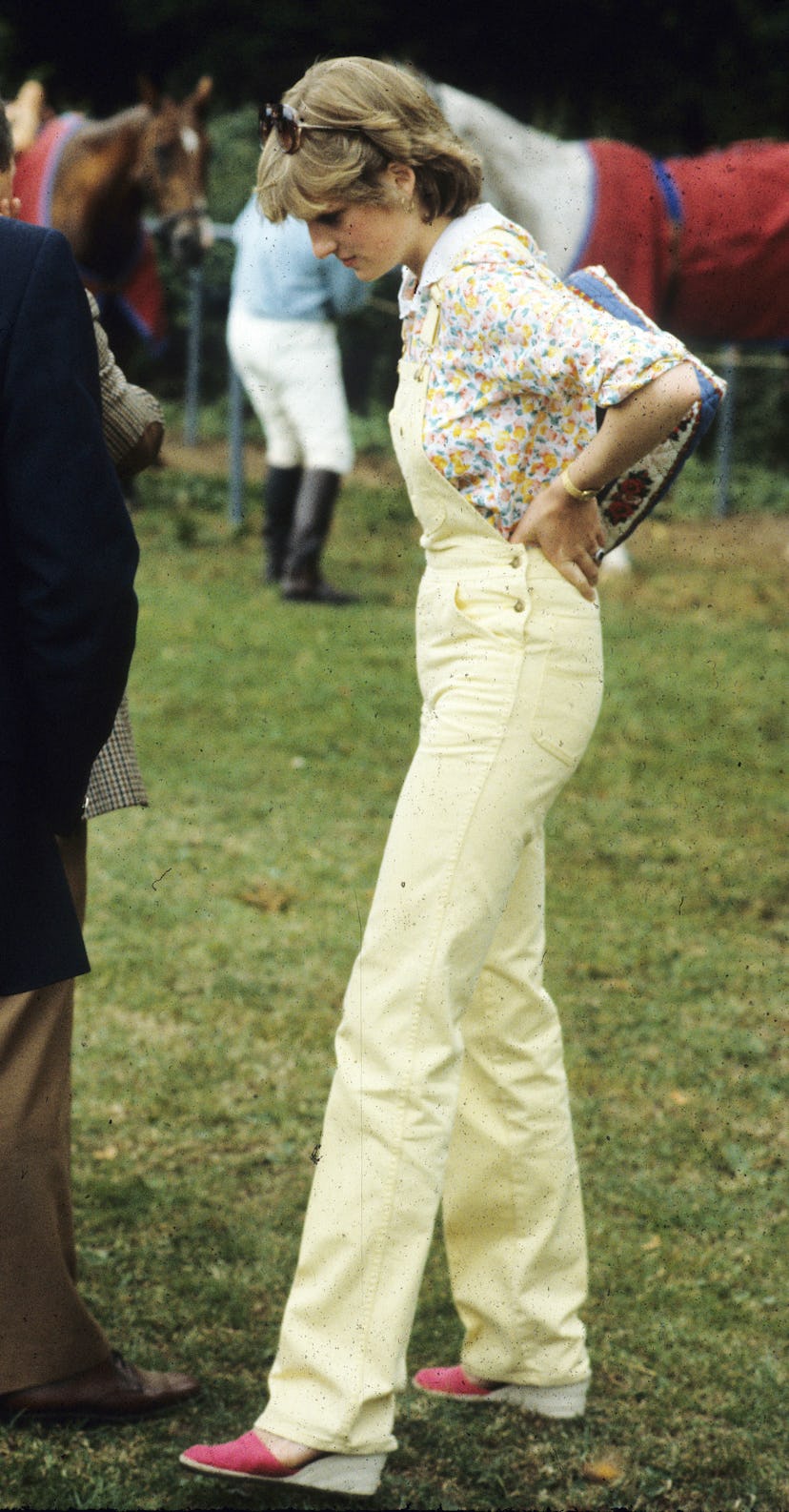 Princess Diana wears yellow overalls with wedges 