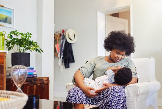 mom breastfeeding baby