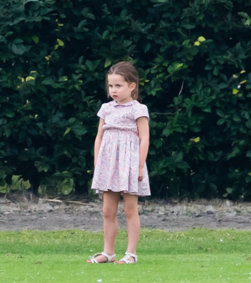 Princess Charlotte plays in sandals