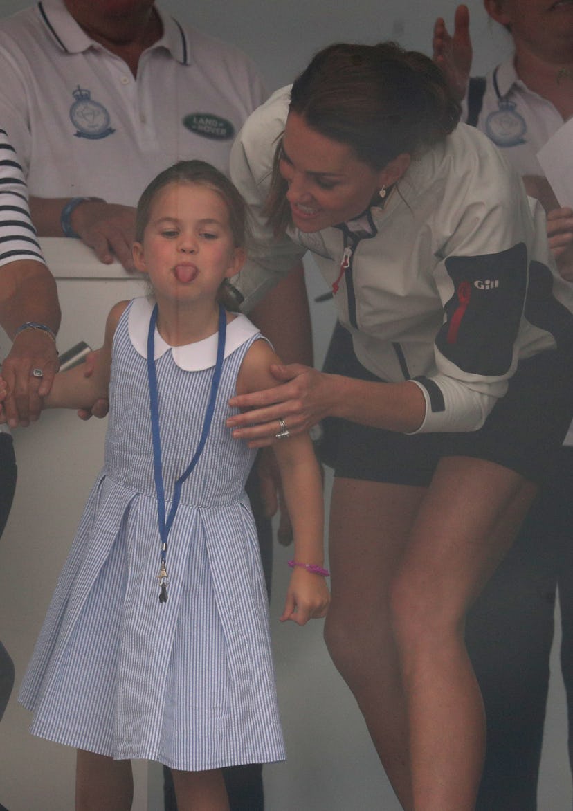 Princess Charlotte sticks out her tongue 