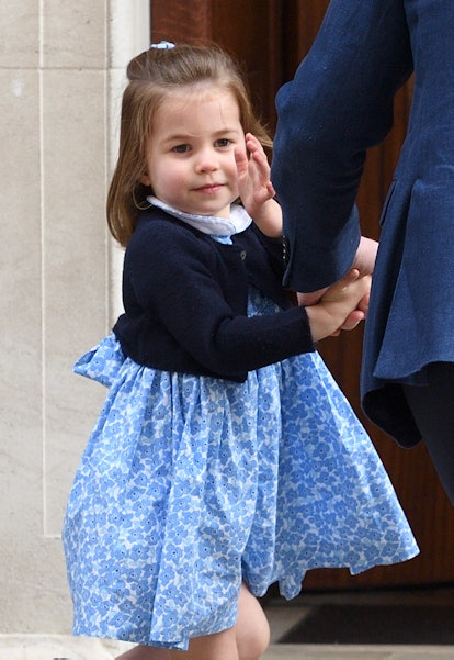 Princess Charlotte waives to the crowd
