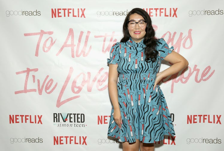 Jenny Han smiles on the red carpet of the 'To All The Boys I've Loved Before' premiere.