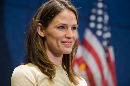Jennifer Garner is photographed in front of the American flag.