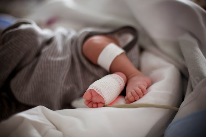 newborn feet hospital incubator