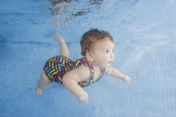 baby swimming underwater