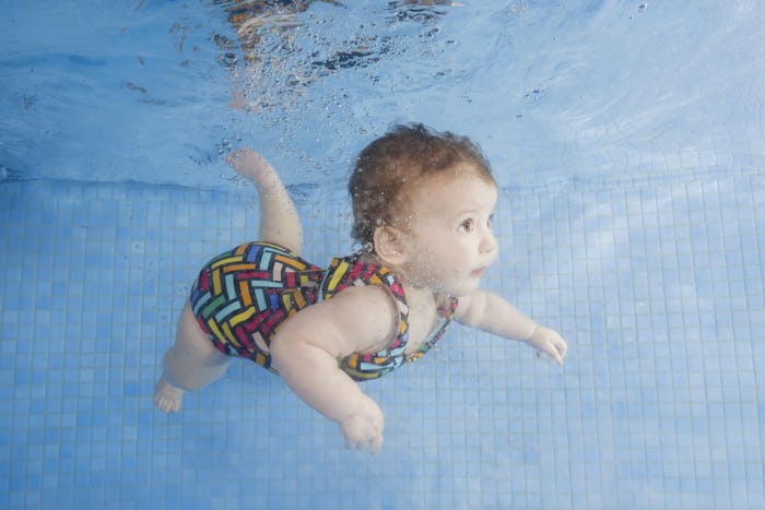 baby swimming underwater