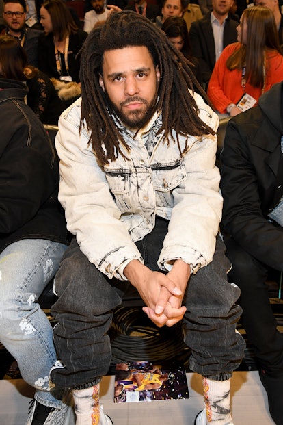 J. Cole attends a Lakers game.