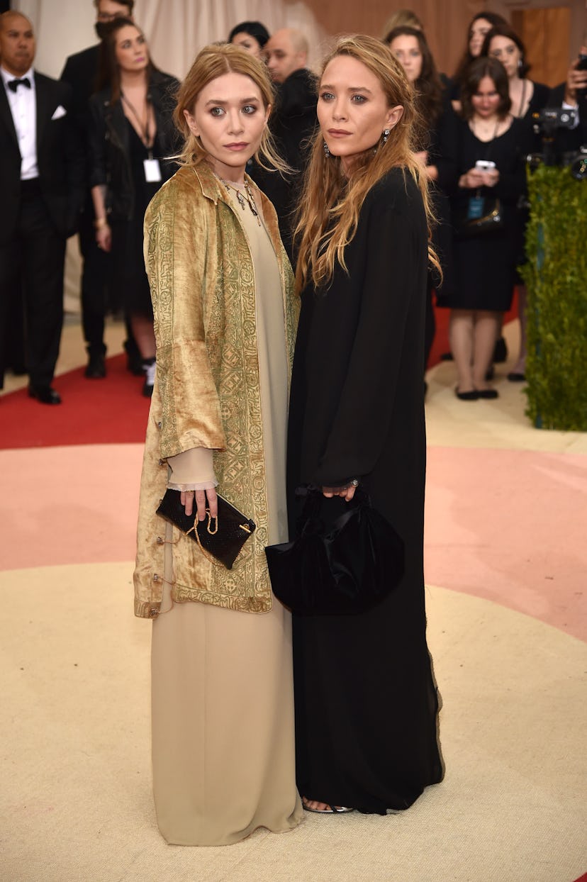 Ashley Olsen (L) and Mary-Kate Olsen attend the "Manus x Machina: Fashion In An Age Of Technology" C...