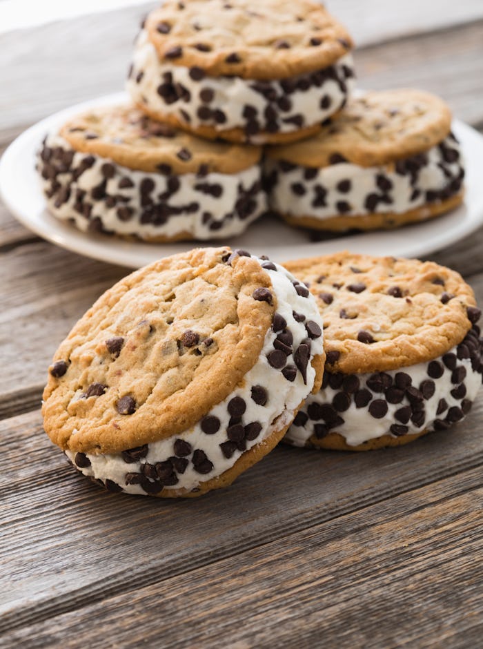 Homemade ice cream sandwiches on a plate with two at the front on the table