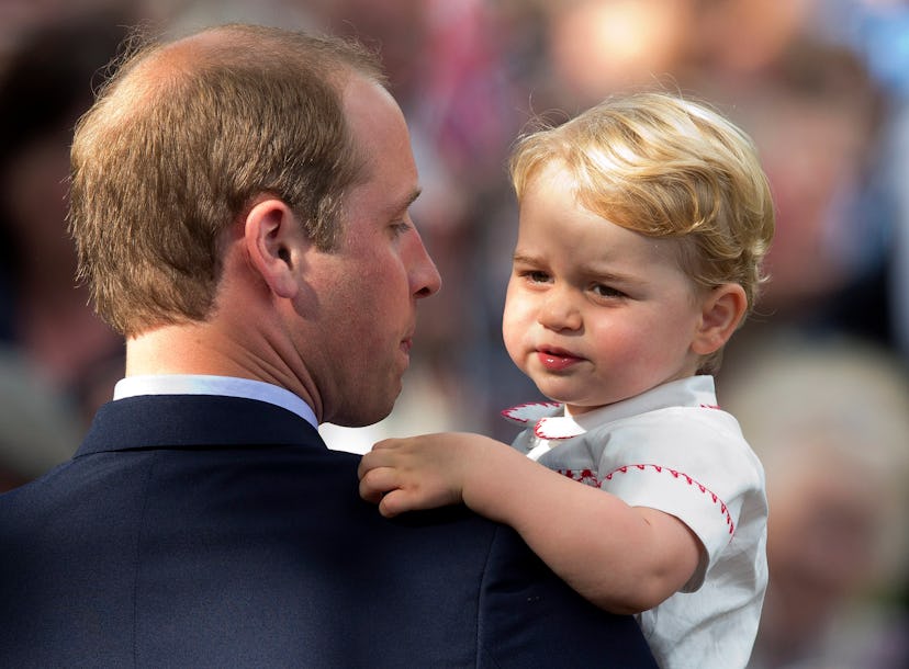 Prince George looked less than impressed to be a big brother in 2015.
