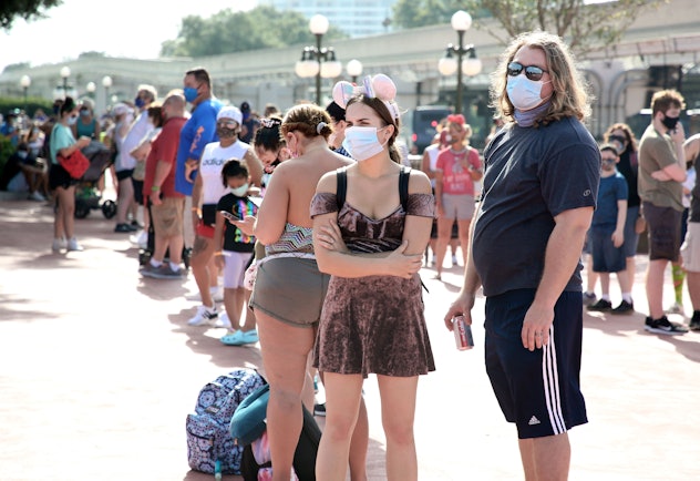 Face masks were everywhere at Disney on Saturday, but so were the iconic Mickey Mouse ears.