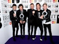 One Direction attend the 2014 Brit Awards.