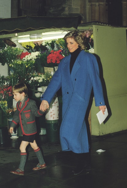 Prince William walks with his mom in his school uniform