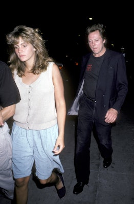 Julia Roberts wearing a white knit tank top with blue pajama shorts