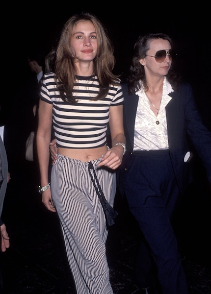 Julia Roberts wearing a stripy fitted top with baggy pants