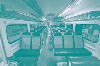 The interior of an empty MTA train carriage.