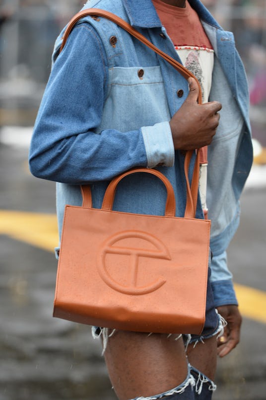 Model with brown Telfar bag
