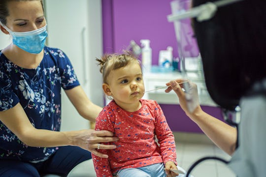 toddler getting coronavirus test