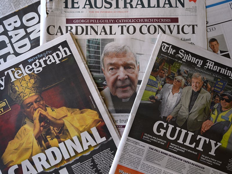 A stack of Australian newspapers can be seen on top of each other, including The Australian, The Syd...