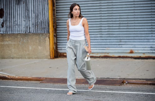 A woman wearing a tank-and-shorts outfit - the two-piece outfit formula you can rely on