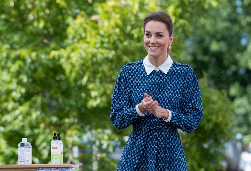 Kate Middleton applies hand sanitizer during a visit to Queen Elizabeth Hospital in King's Lynn