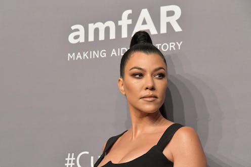 Kourtney Kardashian's metallic pink nail polish is gearing up to be the trending shade of summer