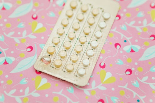 A birth control pill pack on a designed background. Here's how SCOTUS' birth control ruling could af...