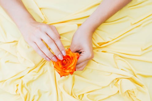 woman holding flower