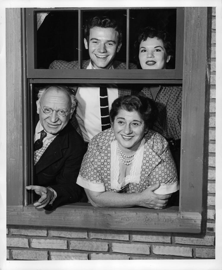 The cast of The Goldbergs, with Gertrude Berg on the lower right.