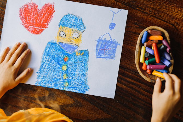 child drawing image with crayongs