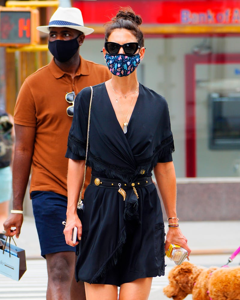 Katie Holmes wearing Prada sunglasses while out in New York City.