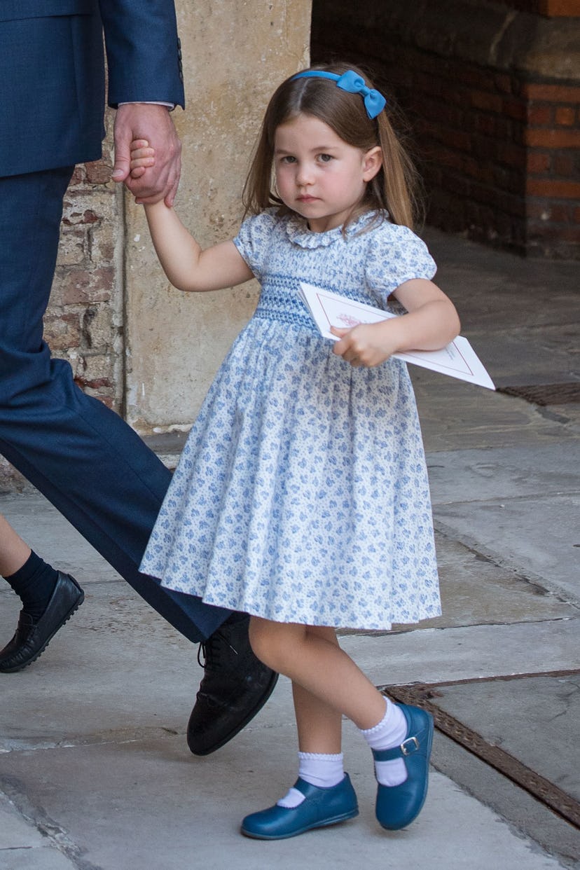 Princess Charlotte gives reporters an attitude along with her thousand-yard stare.