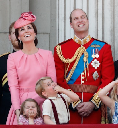 Princess Charlotte closes her eyes as planes fly overhead.