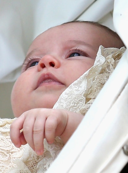 Princess Charlotte looking bored at her christening.