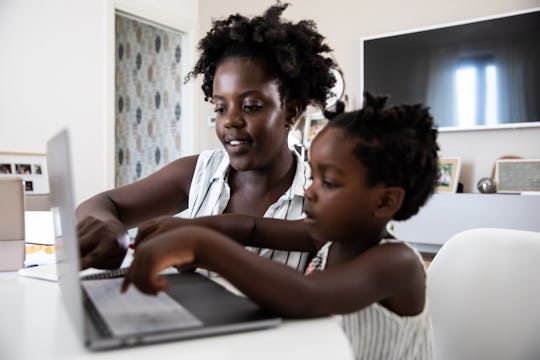 mom and daughter homeschooling 