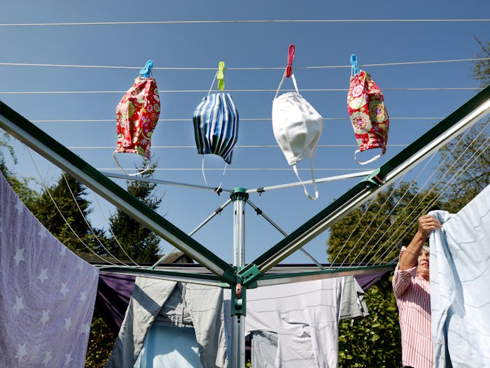 Experts say you can dry face masks in a dryer or hang them out in the sun to completely dry.