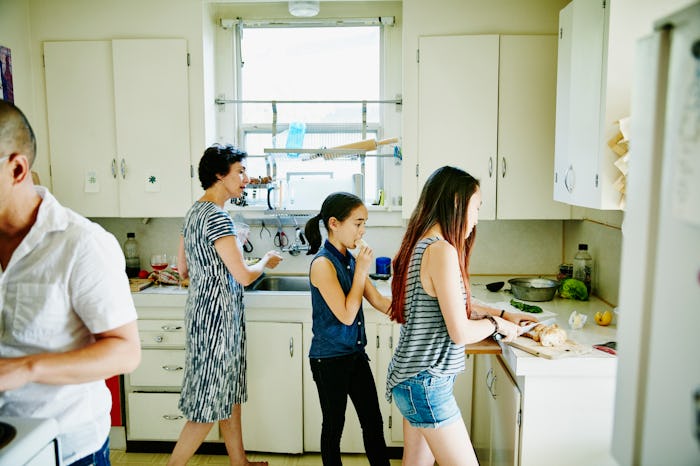 family cooking dinner on busy night
